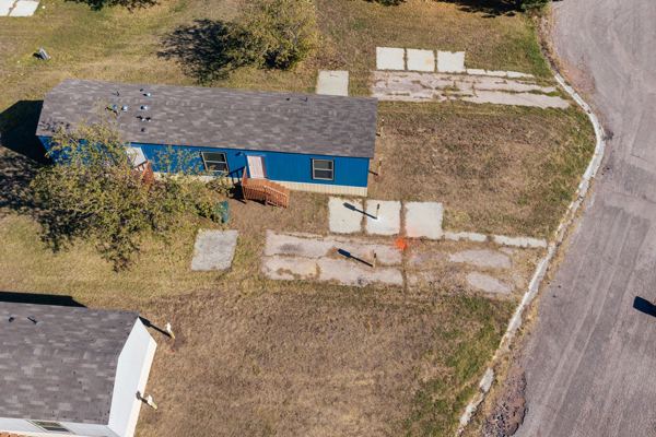 Aerial view of ready-to-build lots along a park street